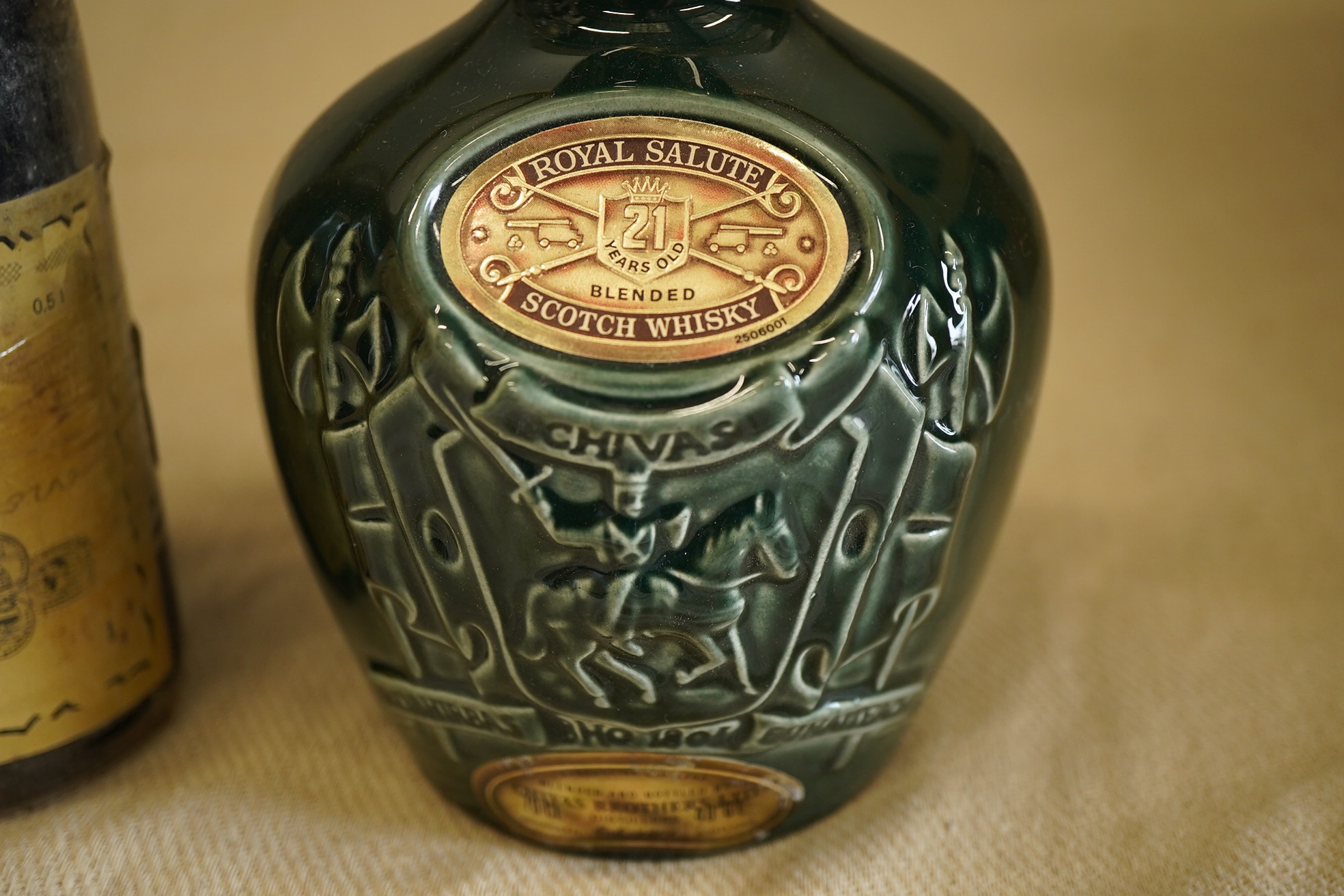 One bottle of 1957 Tokaji Aszu and one ceramic bottle of Chivas Royal Salute Scotch Whisky (2)